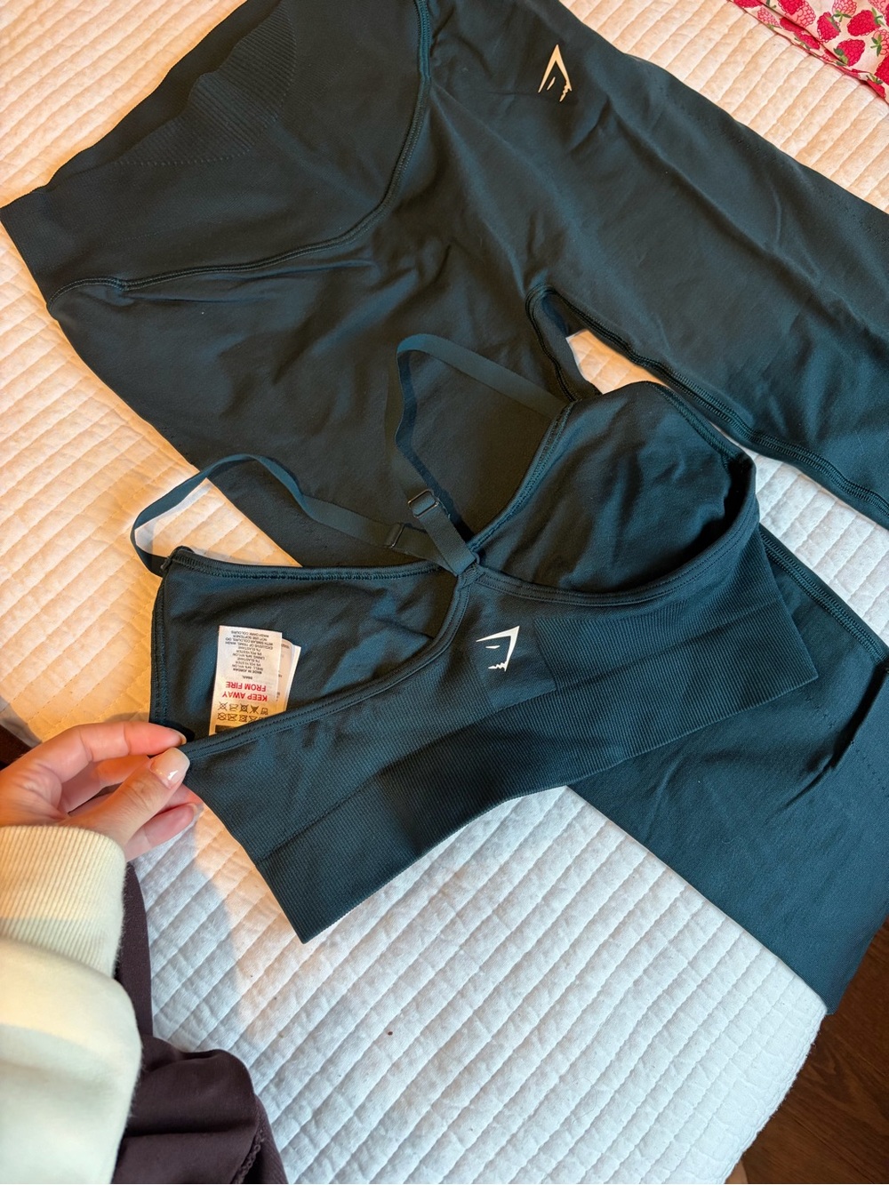 Gymshark Teal Seamless Sports Bra and Leggings Set.